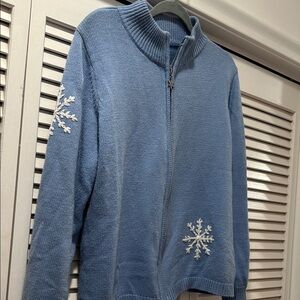 Blue Snowflake Women's Sweater. Full length zipper.